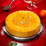 Новогодние рецепты: торт с мандаринами и елочка из профитролей