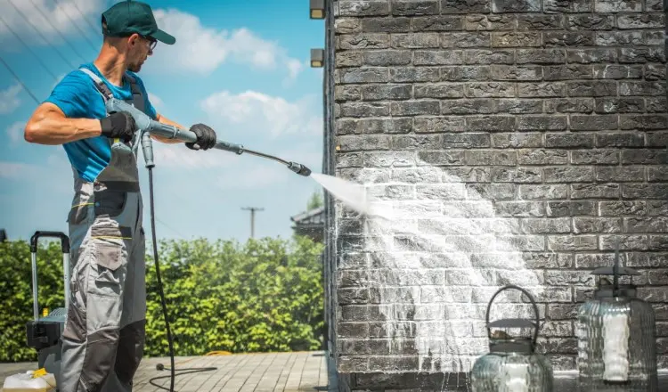 Prepares Surfaces for Renovation or Painting by pressure washing 